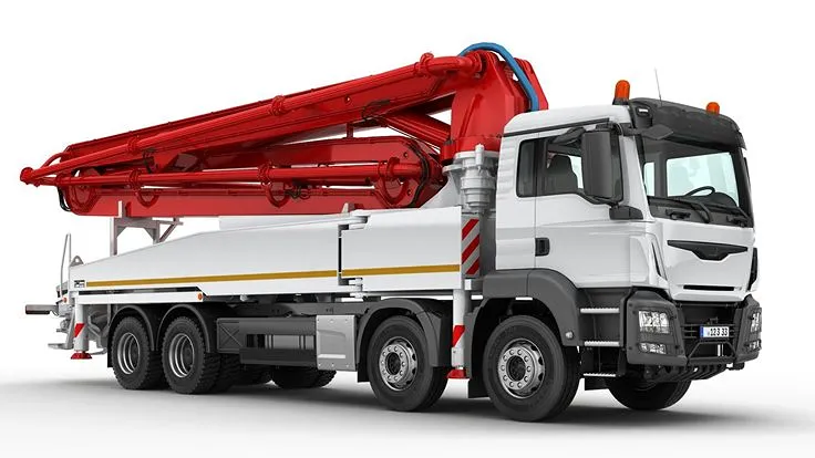 Truk pompa beton (concrete pump) dengan boom terlipat